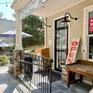 the open sign on the front of the store