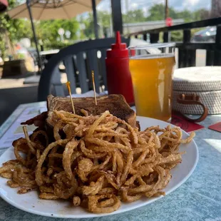 BLT on our eye with my favorite onion rings and a big old beer