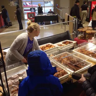 a woman serving a customer