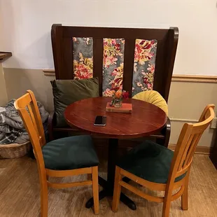 Cozy books and church pews, make for great places to reflect and enjoy your drinks and company.