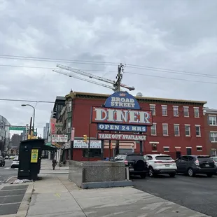 cars parked in front of the restaurant