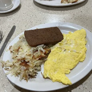 eggs, hash browns, bread and coffee