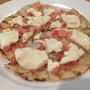 Sad and cold flatbread pizza.