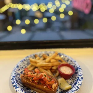 Warm lobster roll with fries
