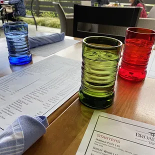 menu and glasses on table