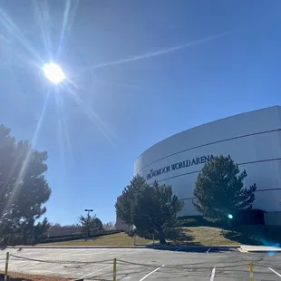 the sun shining over the stadium