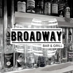 a black and white photo of a bar and grill