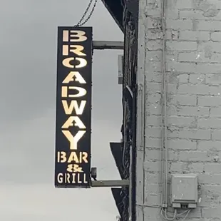 a sign for broadway bar and grill