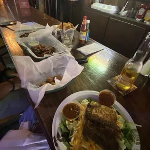 Grilled Fish Salad, Mojo Wings, Hush Puppies, Onion Rings