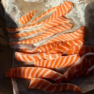 salmon slices in a paper bag