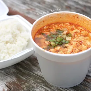 Takeout Soon Dooboo  ($11.35) - Spicy tofu stew with seafood and beef, requested extra spicy. Comes with an egg