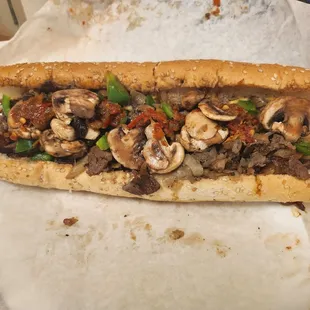 Cheesteak  everything on it mushrooms double cheese and hot pepper and green pepper