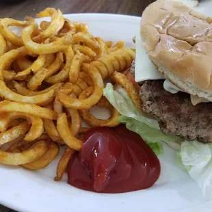 Mushroom and cheese hamburger with curly fries