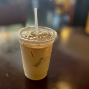 a cold beverage in a plastic cup