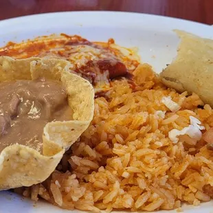 One enchilada, rice, beans and a taco.