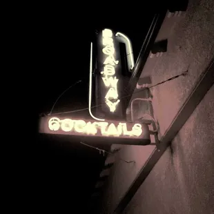 the neon sign for the restaurant