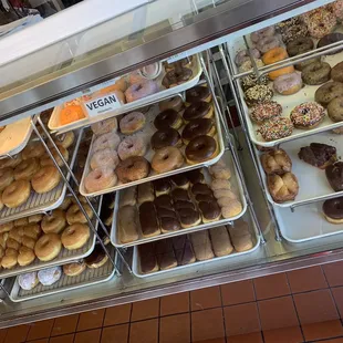 I just had the glazed. It was luscious. Daughter white chocolate covered. Very good! Sketchy homeless around so be careful.