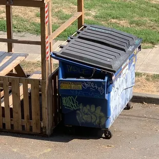 Smelly garbage dumpster