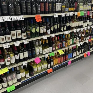 a wide selection of wine on shelves
