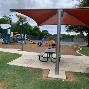 Play ground and seating with shade!