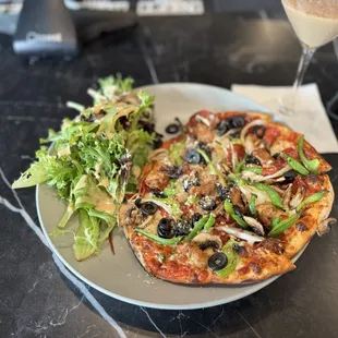 The broadway combo personal pizza and they added a delicious salad! So much flavor, honestly I enjoyed every bite!