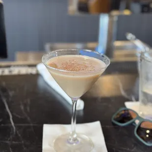 Espresso Martini.  tasty! Bring friends