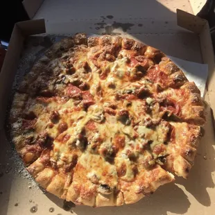 Pepperoni and sausage and mushroom  pizza