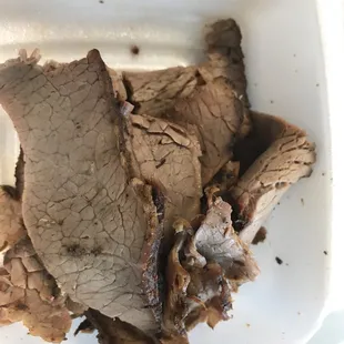Dry flavorless brisket. It looks boiled, no smoke ring.