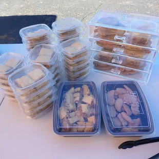 several containers of food on a table