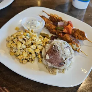 Spicy Xhicken with roasted corn and pototes