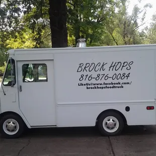 a truck parked in front of a house
