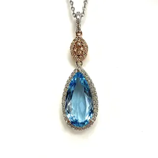 Ladies diamond and aquamarine pendant that has a 7.90 ct pear-shaped aquamarine that measures 20.7 mm by 10.6 mm set in 14k white gold and a