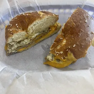 Sausage egg and cheddar pretzel bagel