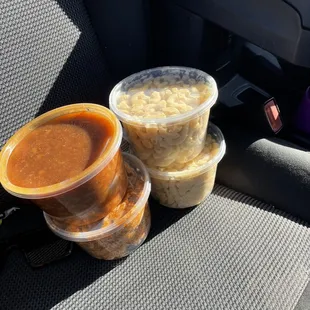 ows three cups of soup in a car