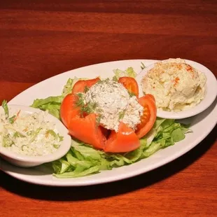 Homemade Chicken Salad cold plate served with cole slaw and potato salad