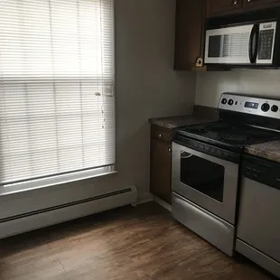 Brockton kitchen- nice appliances, extremely dated cabinets