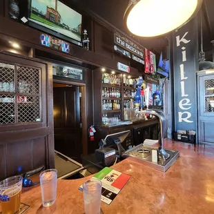 a bar with a wooden bar top