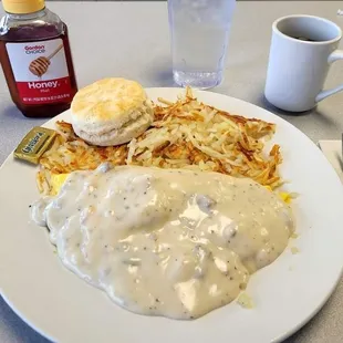 Country Omelette with sausage, onions, green peppers and cheese topped with sausage gravy   served with hash browns and a biscuit