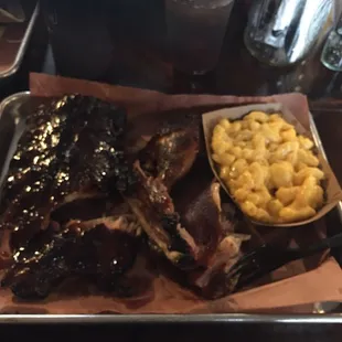 "The Feast" 1/2 rack of ribs, smoked chicken and smoked macaroni and cheese. The best ribs ever!! And their sauces are phenomenal!