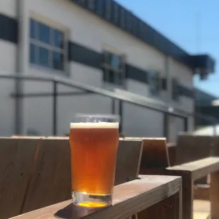 a pint of beer on a table