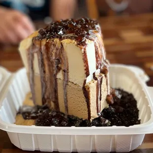 a piece of cake in a styrofoam container