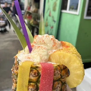 Pineapple coconut smoothie in a pineapple