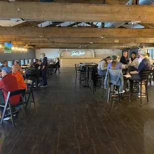 a group of people sitting at tables