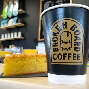 a cup of coffee and a piece of cake