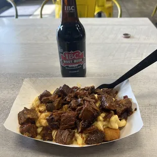 $18 for some burnt ends on top of mac-n-cheese and tater tots. Overpriced.