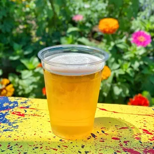 a glass of beer on a table