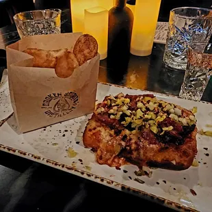 Pastrami pizza and house chips