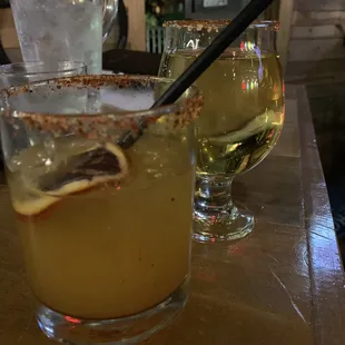 a margarita and a glass of wine