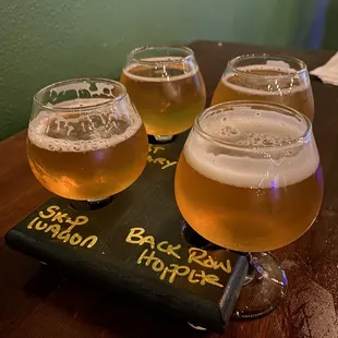 four glasses of beer