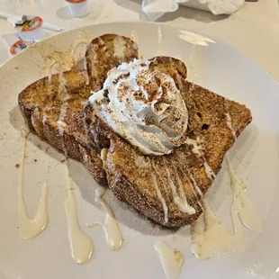 Churro French Toast: Cinnamon &amp; sugar, cream cheese icing, whipped cream.